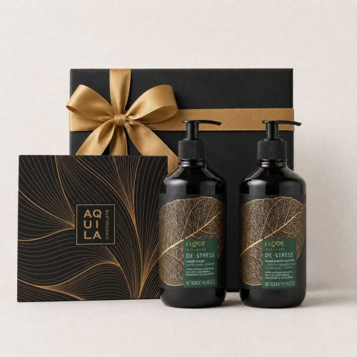Prémium relax ajándékcsomag fekete-arany dobozos Aquila kézműves csokoládéválogatással és I Love Wellness stresszoldó kozmetikumokkal díszdobozban.